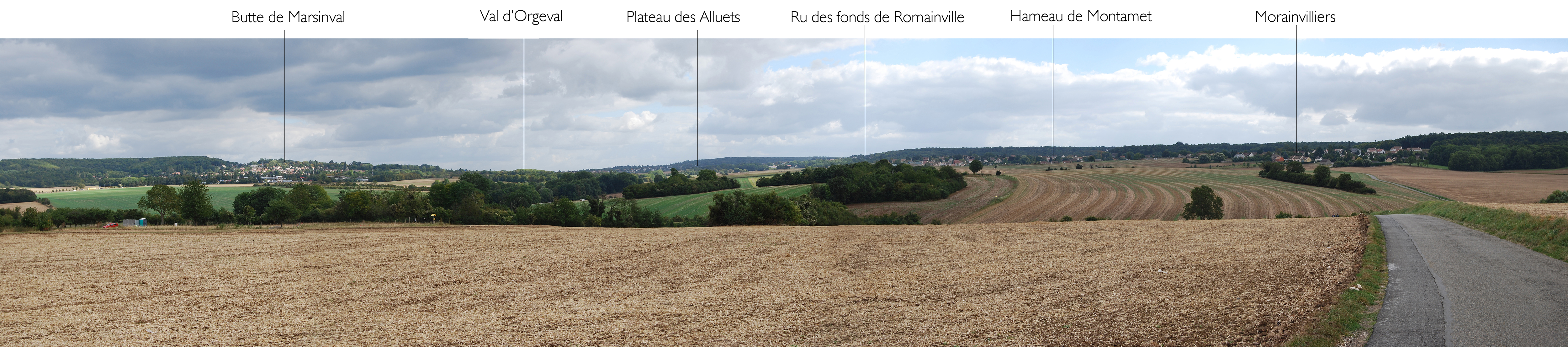 Le Val d'Orgeval entre le relief de la butte de Marsinval et l'horizon sombre des coteaux arborés du plateau des Alluets